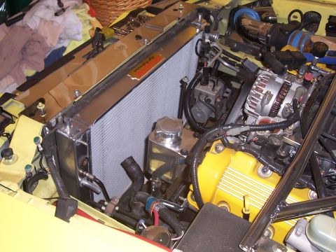 2002 Ford Mustang - Close-up view of a vehicle's engine bay, highlighting the radiator and associated components.