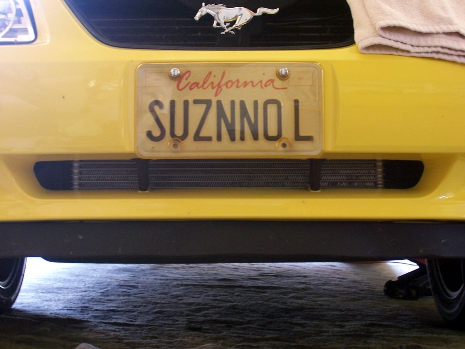 Yellow 2002 Ford Mustang front with California license plate and intercooler