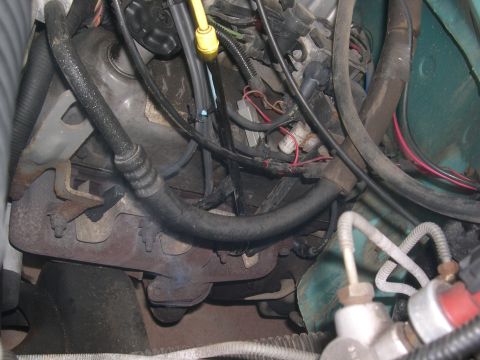 1994 Ford Bronco - You can barely tell...but that's the smoke leaking out between my manifold and the y-pipe...so i found my leak!!!