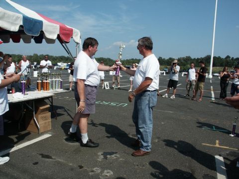 2001 Mercury Grand Marquis - Awards are presented at an outdoor car show event on a sunny day.