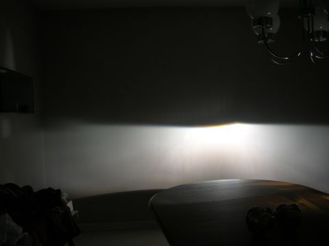 1996 Toyota 4Runner - Headlight beam pattern test on a wall, showing the cutoff line and light spread.