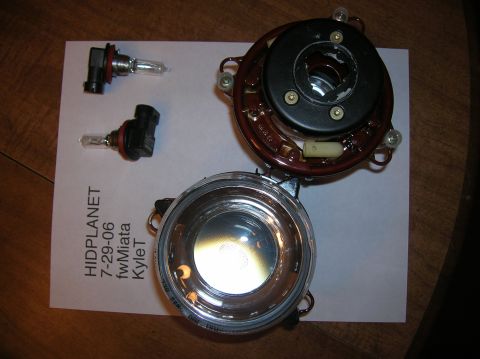 1996 Toyota 4Runner - Disassembled fog light assembly and replacement bulbs are laid out on a piece of paper with handwritten text.