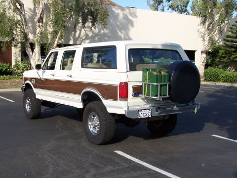 1988 Ford C-350 (Centurion Conversions) - This lifted Ford Bronco Centurion Conversion has a custom rear bumper with a spare tire and jerry cans.