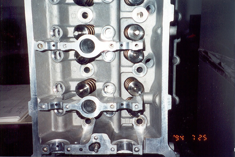 Aluminum cylinder head showing valve springs and cam bearing saddles