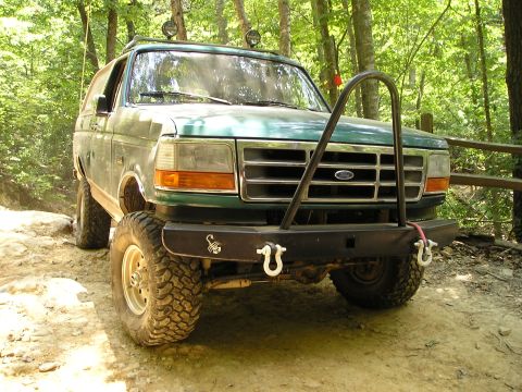 1996 Ford Bronco - This 1996 Ford Bronco is equipped for off-road adventures with its modified bumper and lighting.