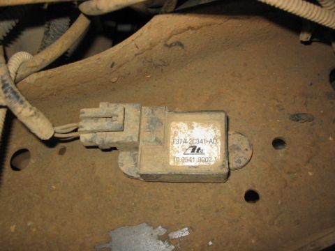1995 Ford Bronco - This is a close-up view of a vehicle's ABS sensor, showing its part number and manufacturer.