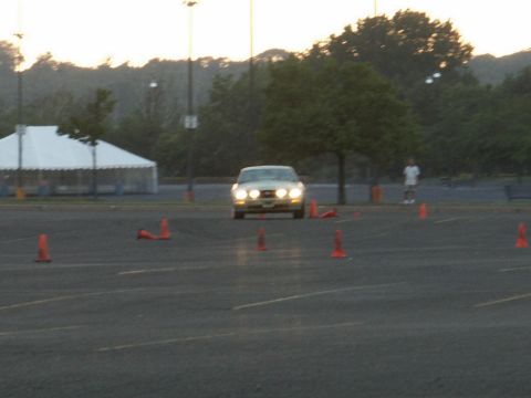 2001 Mercury Grand Marquis - A 2001 Mercury Grand Marquis navigates a cone course during an event.