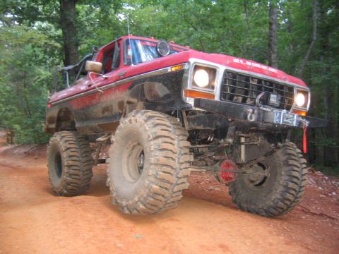 1979 Ford Bronco - This lifted 1979 Ford Bronco is equipped for off-road adventures with its large tires and winch.