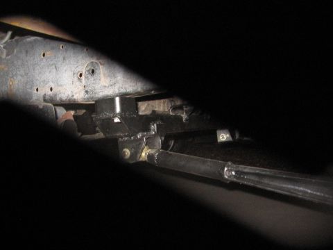 1990 Ford Bronco - Close-up of vehicle frame and suspension components, with visible text from Supermotors.net.