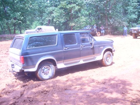 1996 Ford Bronco - This 1996 Ford Bronco appears to be stuck in the mud during an off-road excursion.