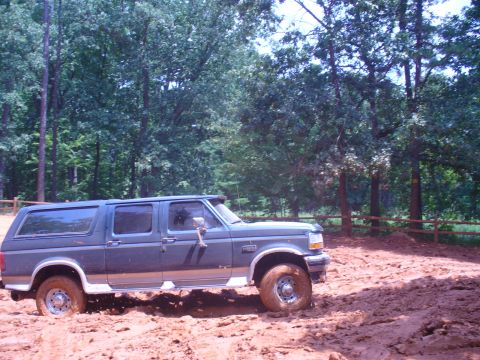 1996 Ford Bronco - This 1996 Ford Bronco is stuck in the mud off-road.