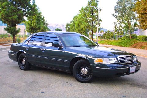 1998 Ford Crown Victoria - This 1998 Ford Crown Victoria is seen from a 3/4 front angle, parked outdoors.