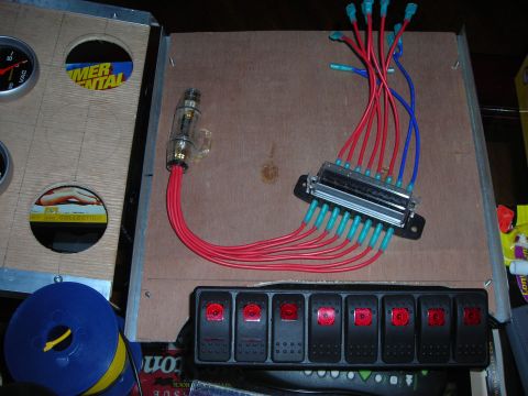 1995 Ford Bronco - Custom wiring setup with fuse box and switches, likely for aftermarket accessories.