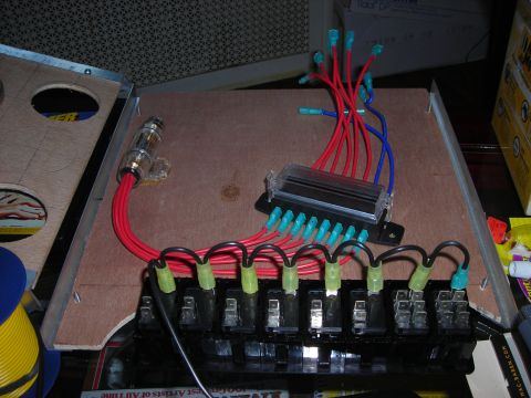 1995 Ford Bronco - Close-up of a custom automotive wiring setup a fuse block and inline fuse holder.