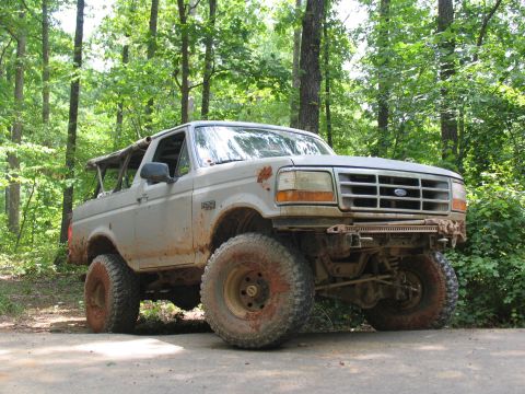 1995 Ford C-350 (Centurion Conversions) - This modified Ford Bronco is equipped for off-road use, with large tires and a lifted suspension.