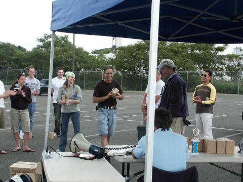 2001 Mercury Grand Marquis - An outdoor event with people gathered under a tent, possibly for an award ceremony.