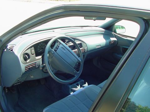 1993 Ford Taurus - This is my interior before the addition of the Cluster with Tach, CD Player, Scanner, and Switchbox.