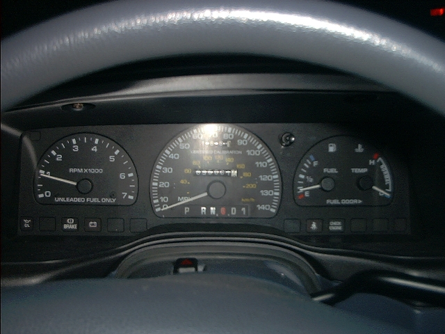 This is my new Cluster with Police Package Speedometer and 7K Tach during the day.