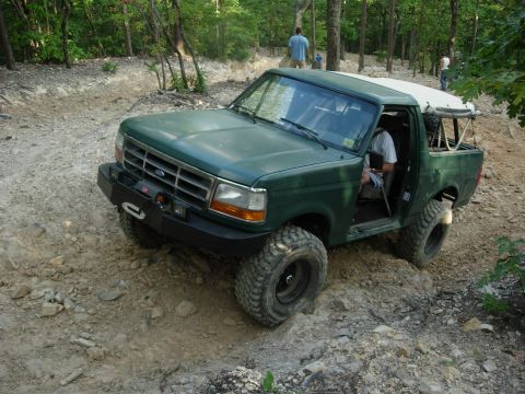 1995 Ford Bronco - This 1995 Ford Bronco navigates a challenging off-road course.