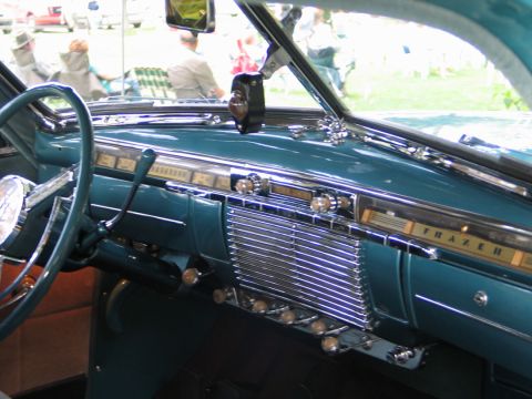1994 Ford Bronco - The interior dashboard features a prominent "FRAZER" badge and chrome detailing.