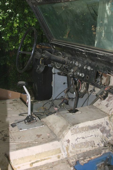 1971 Ford Bronco - Interior view of a 1971 Ford Bronco, the dashboard and shifter assembly.