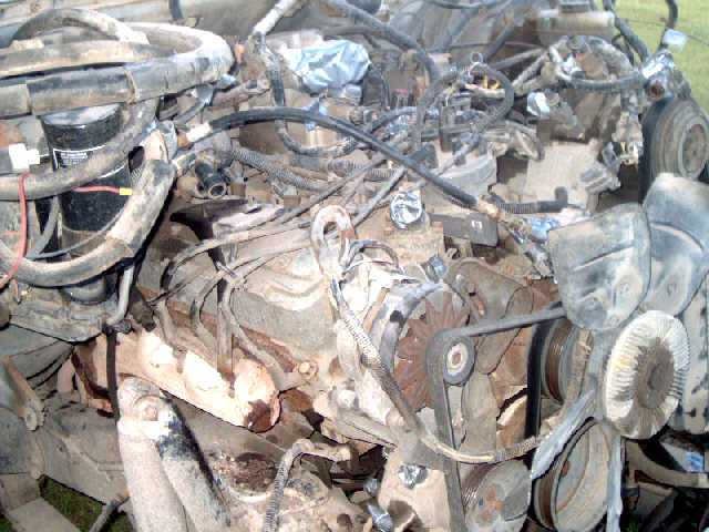 UNplug wiring harness, label each connector & cover all holes.
