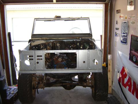 1971 Ford Bronco - This 1966 Ford Bronco is undergoing restoration, with its front clip removed to expose the engine bay.