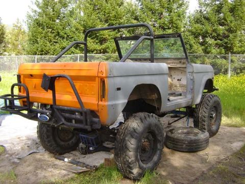 1971 Ford Bronco - This Ford Bronco is undergoing restoration, with its body partially painted and interior stripped.