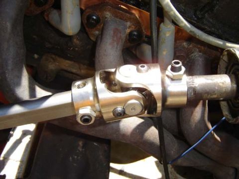 1971 Ford Bronco - Close-up of a vehicle's steering shaft universal joint and associated components.