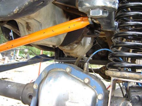 1971 Ford Bronco - Undercarriage view shows suspension and drivetrain parts, including a differential and track bar.