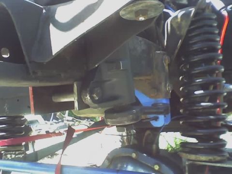 1971 Ford Bronco - Close-up view of a suspension component, likely from a Ford Bronco.
