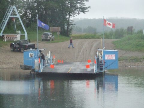 1990 Ford Bronco - The Rosevear Ferry transports vehicles and passengers across a body of water.