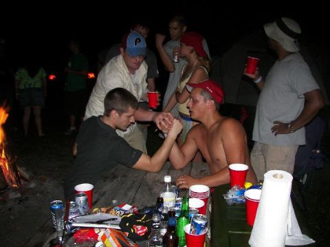 1995 Ford Probe - Friends gather around a campfire for drinks and an arm wrestling match.