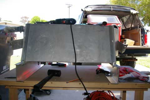 1986 Ford Bronco - Strap bolted to the aluminum channel, excess cut off and edges rounded,