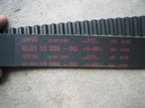1993 Ford Probe - Close-up of a timing belt showing part numbers and manufacturing information.