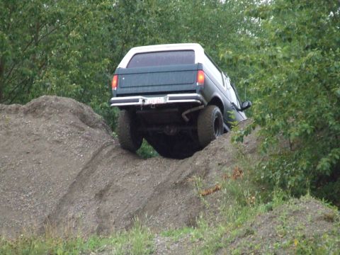 1990 Ford Bronco - This 1990 Ford Bronco navigates an off-road obstacle course.