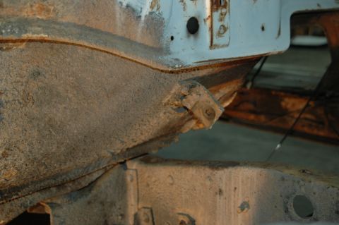 1963 Ford F-250 - Detail of corroded vehicle frame components, showing significant rust and wear.