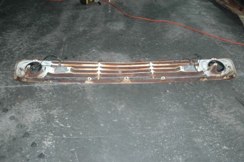 1963 Ford F-250 - Front grille assembly from a 1963 Ford F-250, showing significant rust and missing headlights.