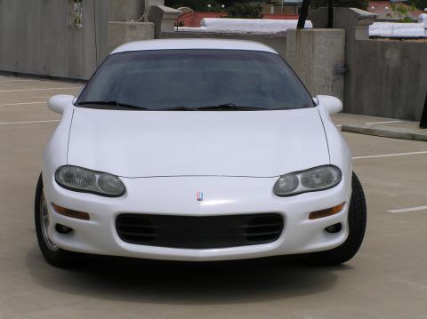 2001 Chevrolet Camaro - Front view of a white 2001 Chevrolet Camaro parked in a lot.