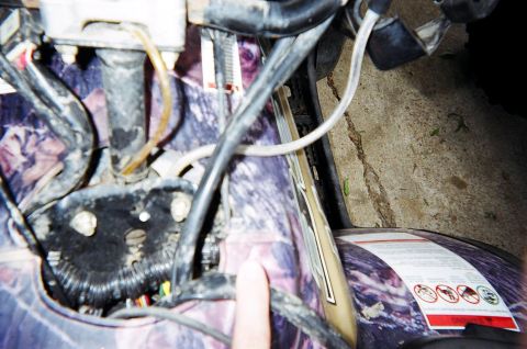 1995 Ford Bronco - Wiring and body panel details of an ATV, camouflage pattern and safety warnings.