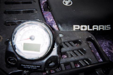 1995 Ford Bronco - Close-up of a Polaris gauge cluster, showing analog and digital readouts.