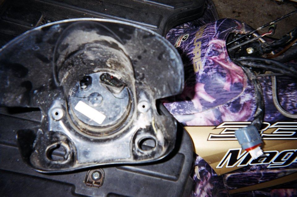 ATV part with camouflage pattern and "Magnum" text