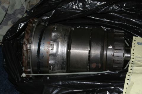 1989 Ford Crown Victoria LTD - A transmission component is shown, partially obscured by black plastic packaging.