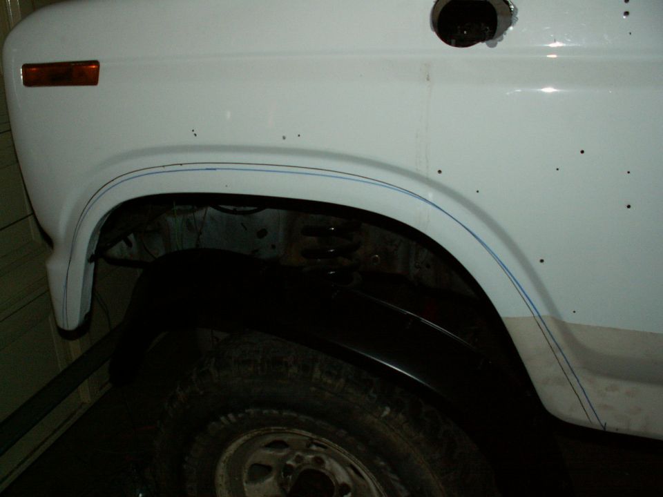 front left wheel arch marked ready to cut for cut-out flares