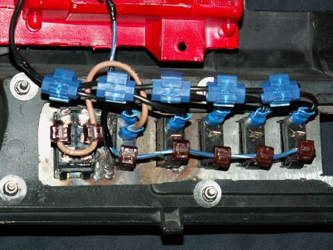 1983 Ford Bronco - switches wired up...big 1 is for winch in and out (via relays) and fed power from winch power isolation switch beside it...others are for s…
