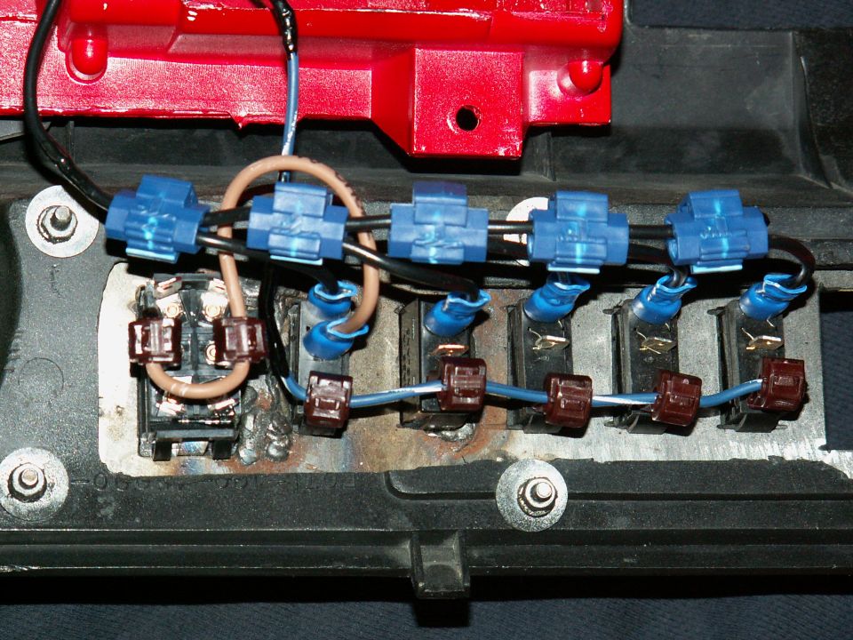 switches wired up...big 1 is for winch in and out (via relays) and fed power from winch power isolation switch beside it...others are for spotlights