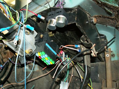 1983 Ford Bronco - The 'Its A Snap' fuse block mounted on flat metal beside steering column....srcrewed thru the base of fuse block....21 circuits (3 more tha…