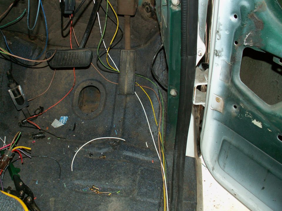 wiring for rear of truck (back-up lights, brake lights, taillights and RR turnsignal) will run under edge of carpet and down sill.....quick connectors inside base of b-pillar then route wiring inside trim to rear....no chassis wiring under truck anymore!!