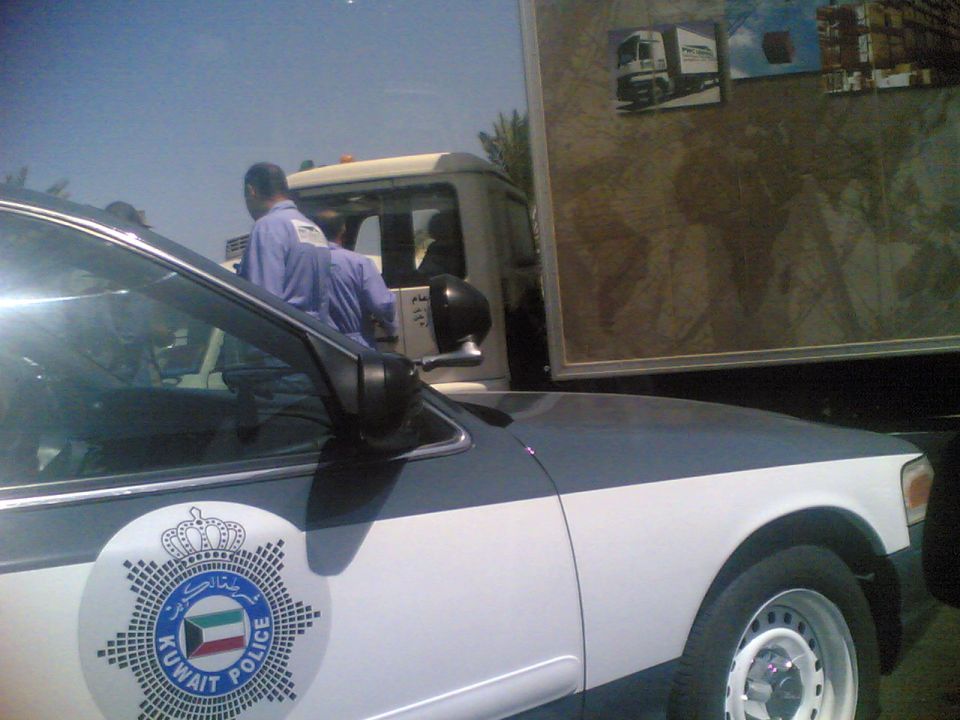 1999 Mercury Grand Marquis police car with Kuwait Police emblem on the side