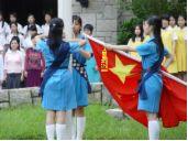 1988 Ford Bronco - A group of girls in blue uniforms are holding a flag during an outdoor event.